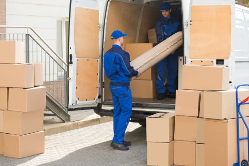 Local removals team preparing boxes for a move in Woodford Green