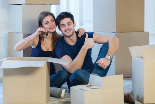 Professional removals team handling a home move in Woodfordgreen